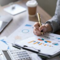 Businesswoman pointing at expense chart Budget management, income tax, financial statements, budgets, important financial document.